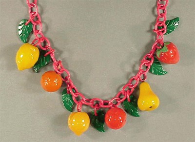 Lot 418 - Bakelite and Celluloid Necklace The chain...