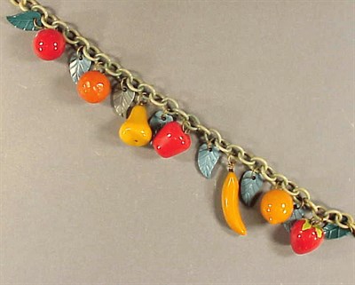 Lot 458 - Bakelite and Celluloid Necklace The chain...