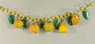 Lot 417 - Bakelite and Celluloid Necklace The chain...