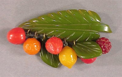 Lot 420 - Bakelite Brooch Depicting a leaf suspending...