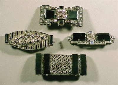 Lot 56 - Four Theodor Fahrner Onyx and Marcasite Pins...