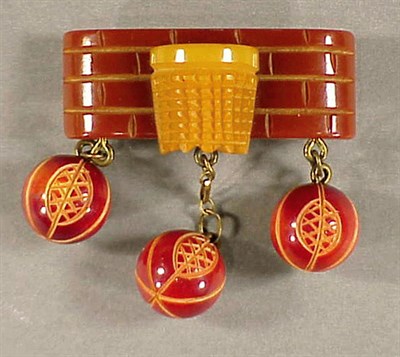 Lot 481 - Bakelite Brooch Depicting a brick wall and net...