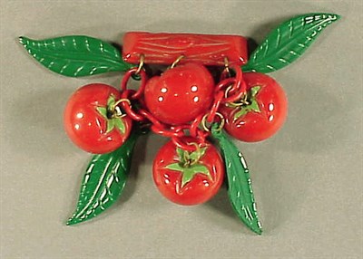 Lot 419 - Bakelite and Celluloid Brooch Depicting a log...
