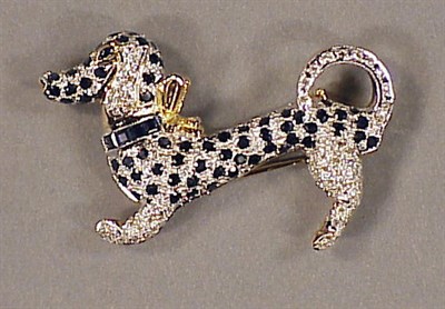 Lot 169 - Sapphire and Diamond Dog Pin 18 kt. yellow...