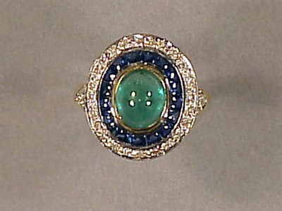 Lot 434 - Diamond, Emerald and Sapphire Ring 18 kt....