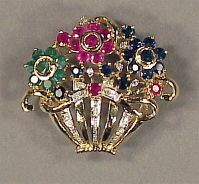 Lot 211 - Diamond, Emerald, Ruby and Sapphire Pin 14 kt....