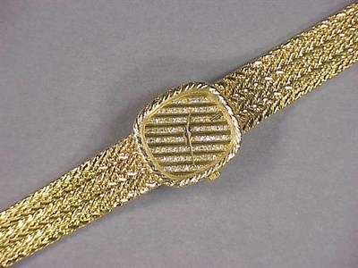 Lot 323 - Lady's Gold and Diamond Wristwatch 18 kt....