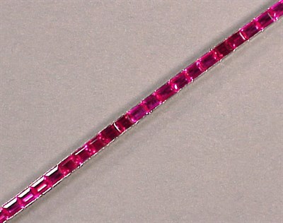 Lot 582 - Synthetic Ruby Line Bracelet Platinum,...