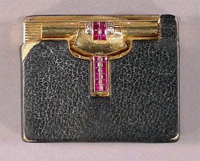 Lot 329 - Gold, Diamond and Ruby Compact 14 kt. yellow...