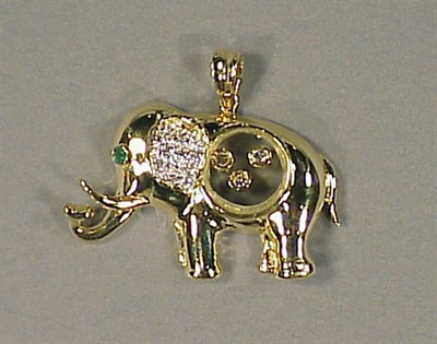 Lot 128 - Gold and Diamond Elephant Pendant 18 kt....