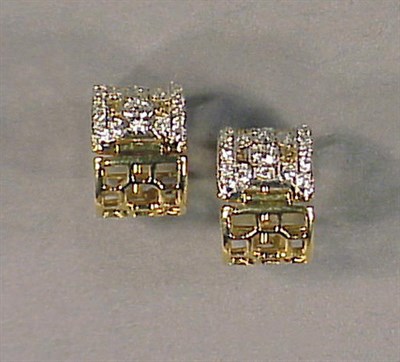 Lot 129 - Pair of Diamond Huggie Earrings 18 kt. yellow...