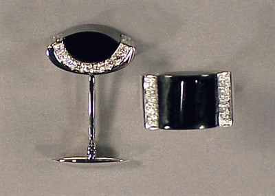 Lot 356 - Pair of Black Onyx and Diamond Cufflinks 18 kt....