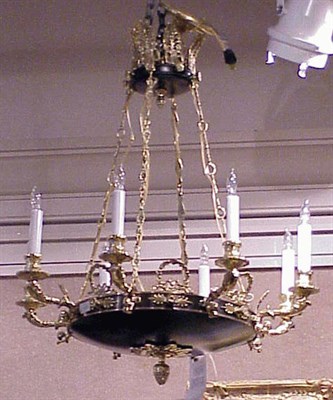 Lot 472 - Empire Style Brass Eight-Light Chandelier