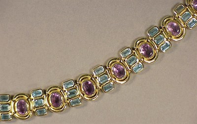 Lot 234 - Gold, Blue Topaz and Amethyst Necklace and...