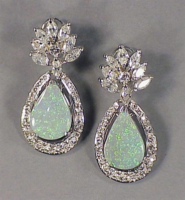 Lot 500 - Pair of Opal and Diamond Earrings 18 kt. white...