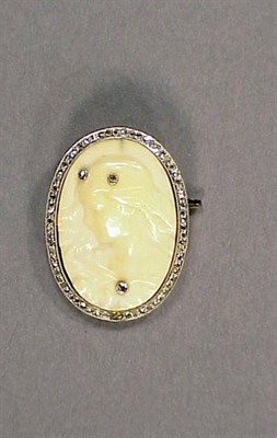 Lot 318 - Antique Ivory Cameo and Diamond Pin The frame...