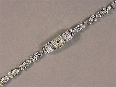 Lot 625 - Lady's Diamond Wristwatch Platinum, the...