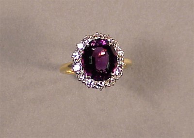 Lot 221 - Amethyst and Diamond Cluster Ring 14 kt....
