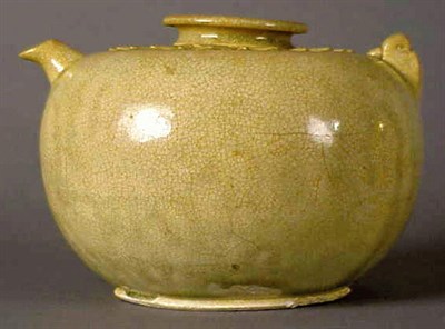 Lot 232 - Small Vietnamese Pale Olive Glazed Ewer 13th...
