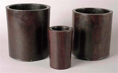 Lot 215 - Three Zitan Bitong The two larger brush pots...