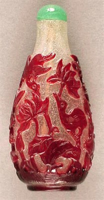 Lot 253 - Red Overlay Glass Bottle with Designs of Birds...