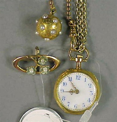 Lot 106 - Gold Lapel Watch with Chain and Fob 14 kt....