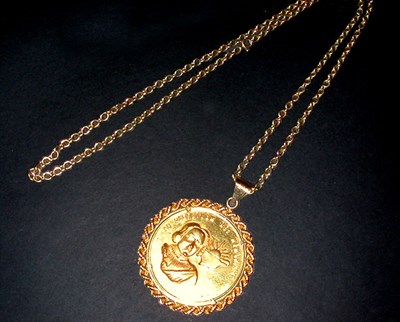 Lot 167 - Gold Medallion with Chain 14 kt. yellow gold,...