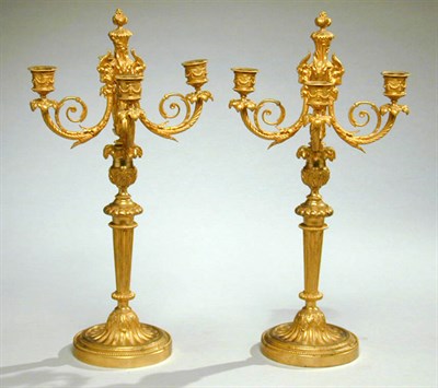 Lot 669 - Pair of Louis XVI Style Gilt-Bronze Four-Light...