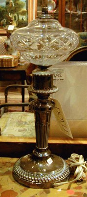 Lot 167 - Two Silver Plated and Glass Lamps