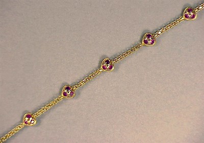Lot 437 - Gold and Ruby Necklace 18 kt. yellow gold, set...