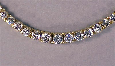 Lot 443 - Gold and Diamond Necklace 14 kt. yellow gold,...