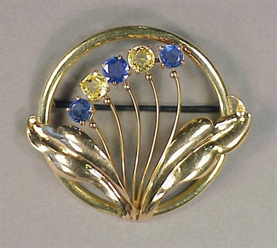 Lot 397 - Retro Blue and Yellow Sapphire Brooch 14 kt....