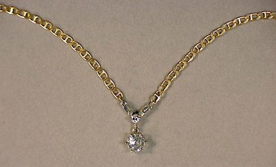 Lot 199 - Diamond Pendant Necklace The 14 kt. yellow...