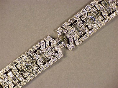 Lot 629 - Diamond Bracelet Platinum, the three-quarters...