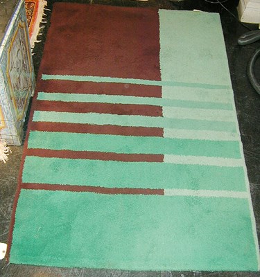 Lot 239 - Art Deco Carpet In green and brown with a...