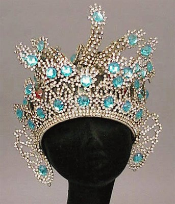 Lot 21 - Jeweled Headdress The wire helmet decorated...