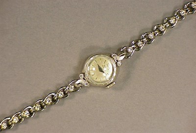 Lot 428 - Lady's Gold and Diamond Wristwatch 14 kt....