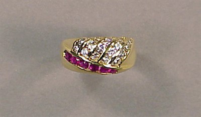 Lot 389 - Gold, Diamond and Ruby Ring 18 kt. yellow gold,...