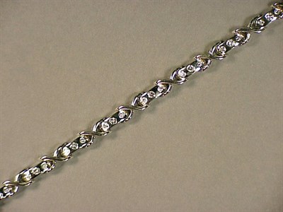 Lot 601 - Gold and Diamond Bracelet 14 kt. white gold,...