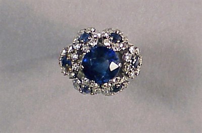 Lot 542 - Synthetic Sapphire and Diamond Cluster Ring...