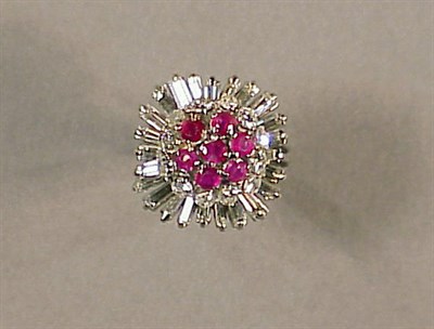 Lot 579 - Ruby and Diamond Ballerina Ring Platinum, set...