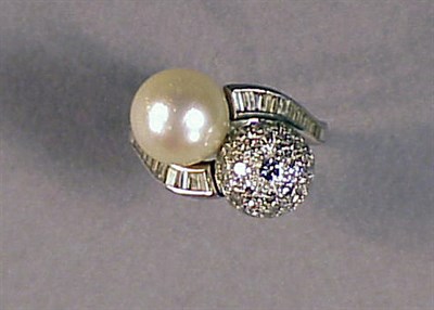 Lot 505 - Pearl and Diamond Crossover Ring Platinum, set...