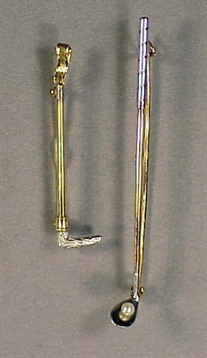 Lot 56 - Two Gold Pins 14 kt. yellow gold and platinum,...