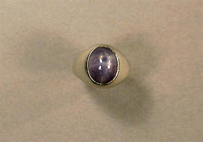 Lot 439 - Lady's Star Sapphire Ring Platinum, the gypsy...