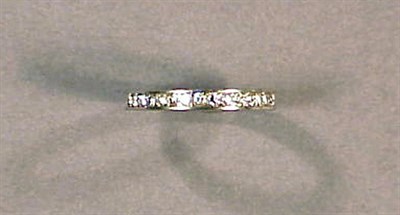 Lot 155 - Platinum and Diamond Wedding Band Channel-set...