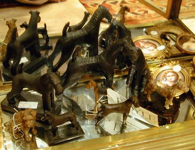 Lot 308 - Group of Eight Bronze Dogs