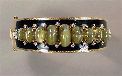 Lot 477 - Gold, Diamond and Cat's-Eye Chrysoberyl Bangle...