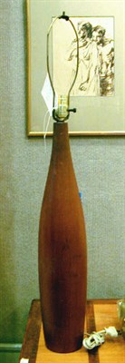 Lot 167 - Pair of Teak Lamps Each of bottle form. Height...