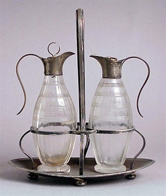 Lot 337 - Sterling Silver and Glass Cruet Set Maple & Co,...