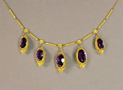 Lot 261 - Gold and Amethyst Necklace 18 kt. yellow gold,...